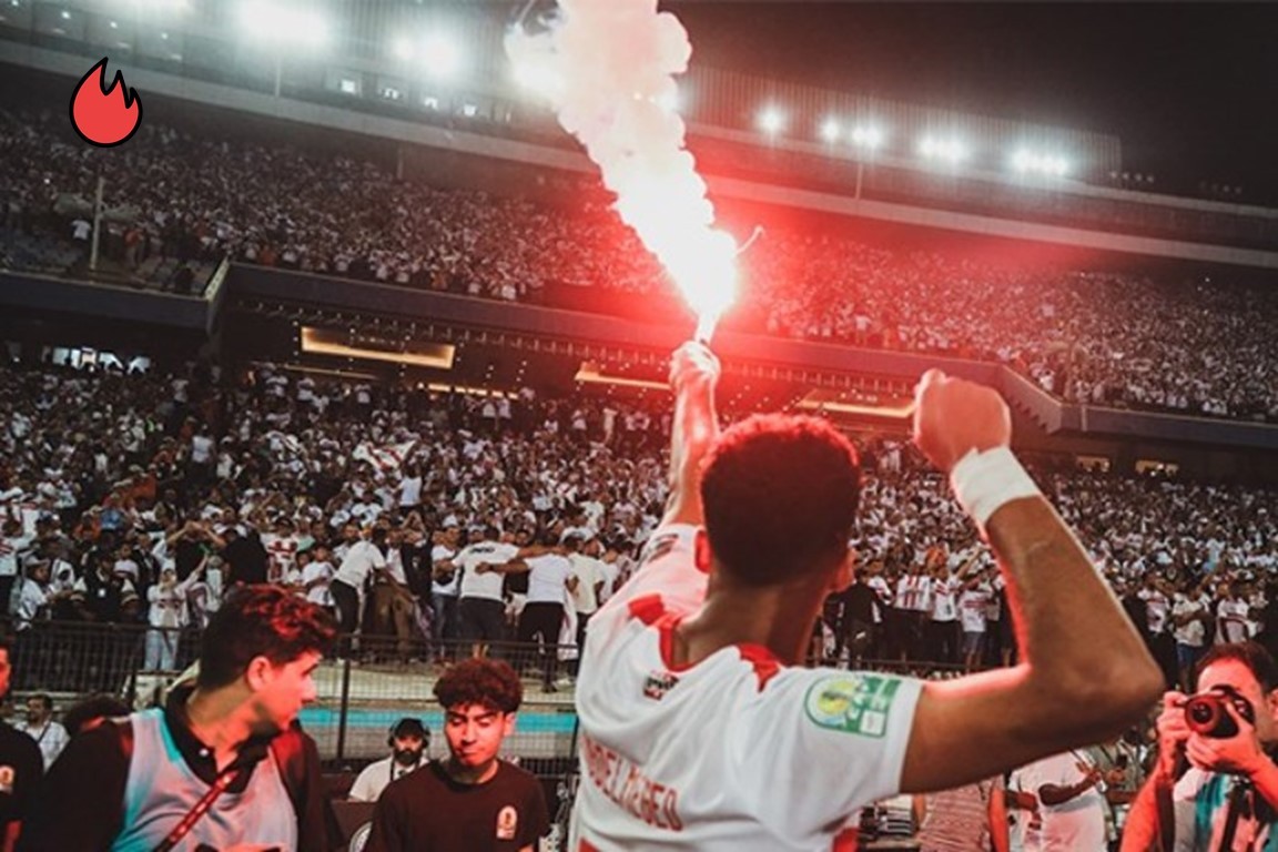 فريق نادي الزمالك لقيامهم بأعمال شغب غير قانونية على مدرجات الجماهير وأرض الملعب باستاد القاهرة الدولي